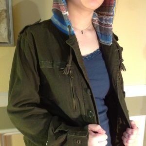 Dark green jacket with patterned hood